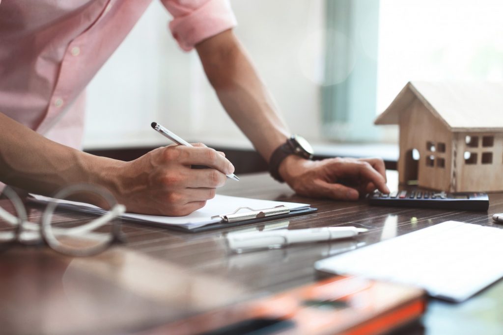 Man creating plans for custom home building